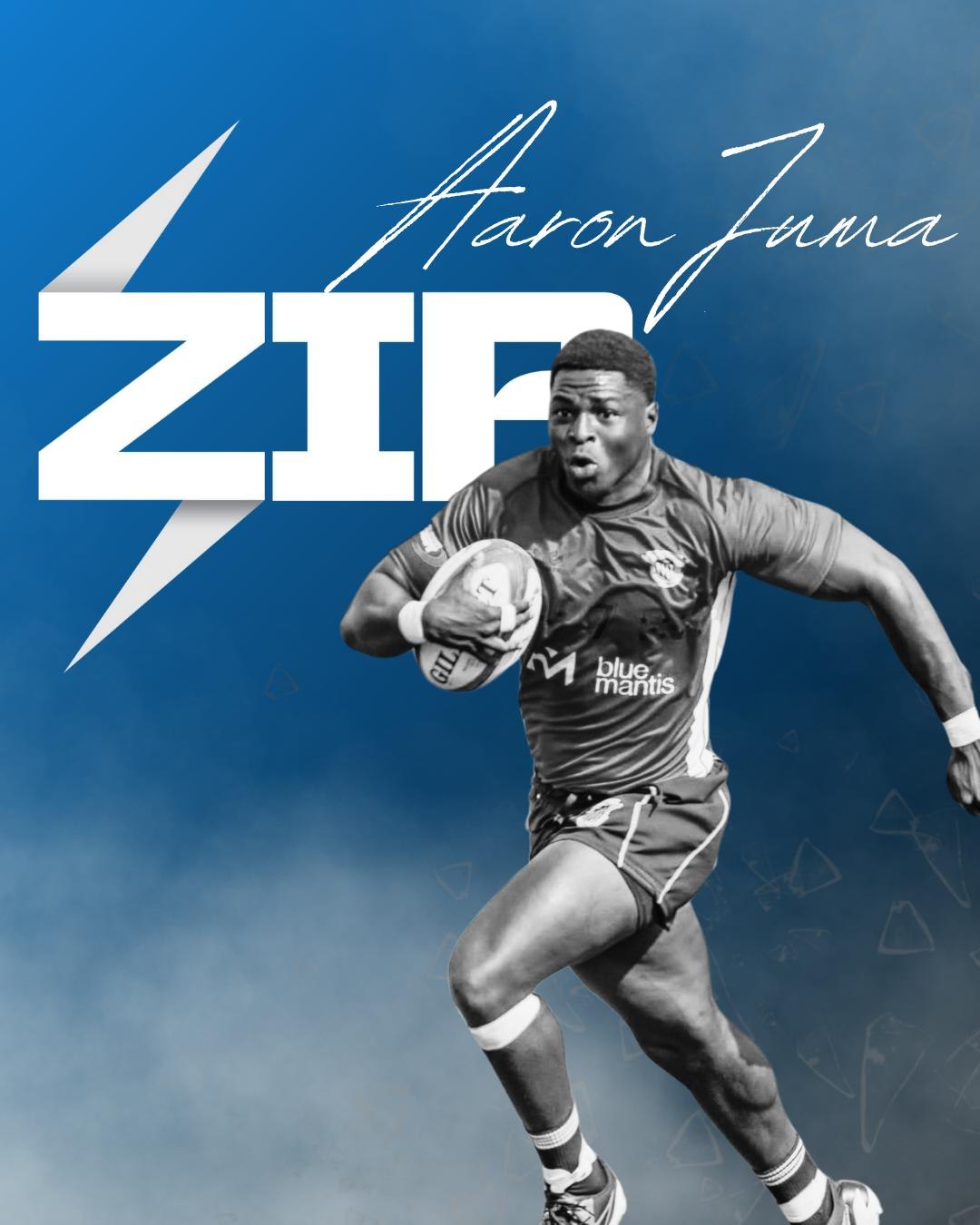 Drop 01 promotional artwork: Aaron Juma running with the ball in monochrome over a royal blue ZIP lightning-bolt backdrop